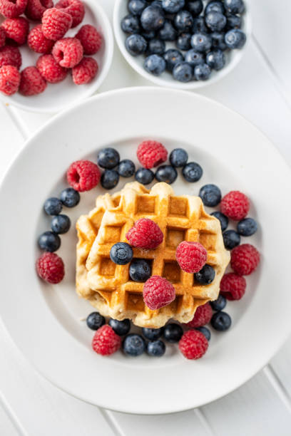 istock Waffles with blueberries and raspberries. 1181701453