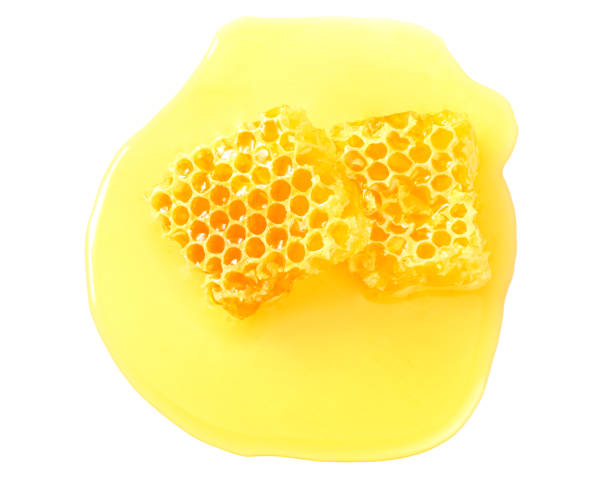 istock Honeycomb with honey isolated on white background. top view 1181701787