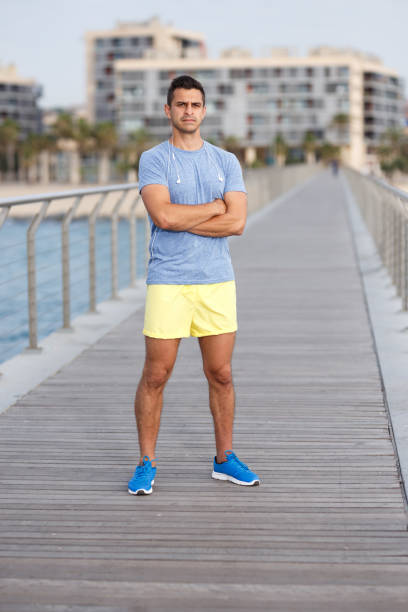 istock Sporty man posing outdoors 1181702991