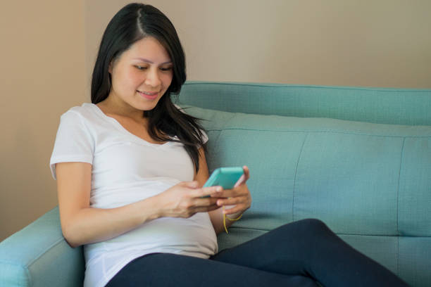 istock Relaxing with her mobile phone 1181706503