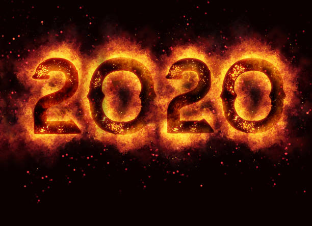 istock Burning sign with new year 2020 on black background 1181710317