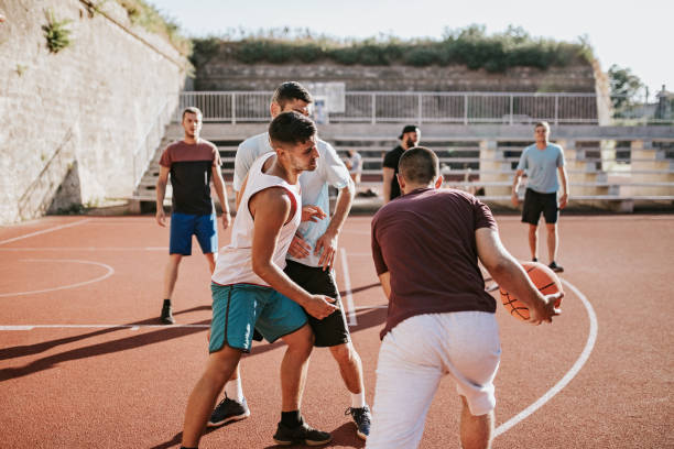 istock Men playing basketball 1181711975