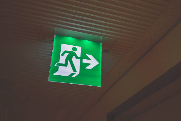 istock Close up of emergency exit and signs 1181712144