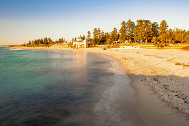 Cottesloe Beach as the sun goes down Cottesloe Beach as the sun goes down - long exposure cottesloe beach stock pictures, royalty-free photos & images