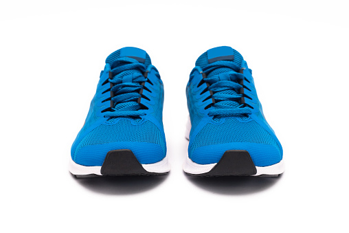 Blue sport shoes isolated on white background.