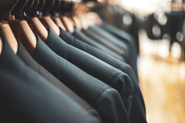 istock Men's suit displayed on a hanger 1181713348