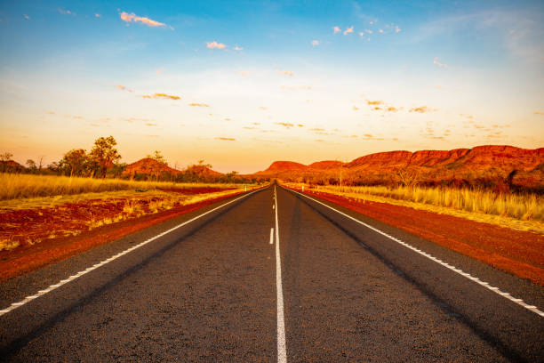 Australian Outback Highway The Highway south of Kununurra is a great back drop kimberley plain stock pictures, royalty-free photos & images