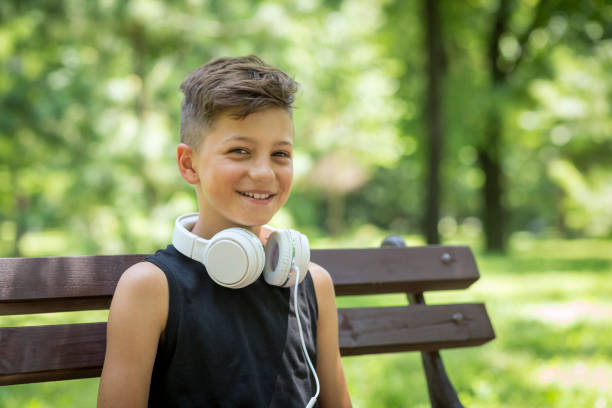 istock Joyful boy with headphones 1181715197