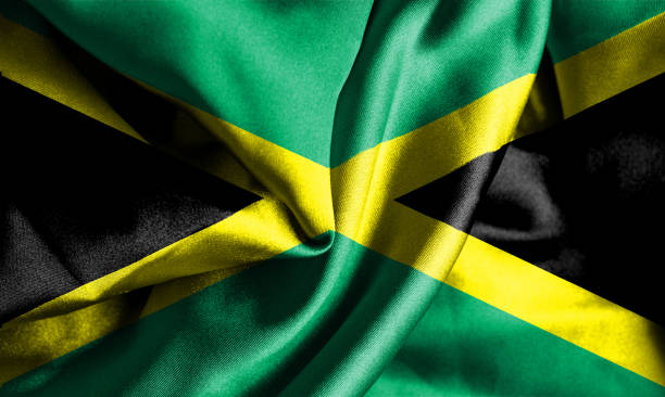 istock Jamaica waving flag 1181716452