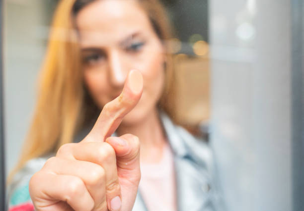 futuristic digital processing of biometric fingerprint scanner. concept of surveillance and security scanning of digital programs and fingerprint biometrics. cyber futuristic applications, future.