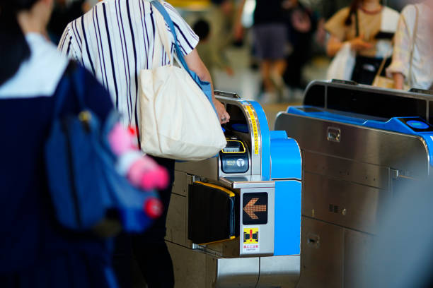 istock Train ticket gates and people 1181718192