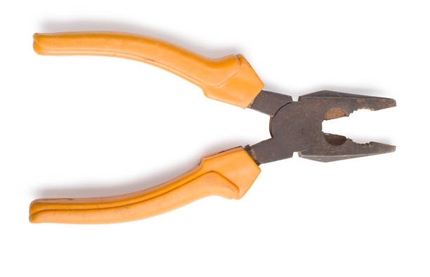 istock Used yellow plier placed on white background with clipping path. 1181718307