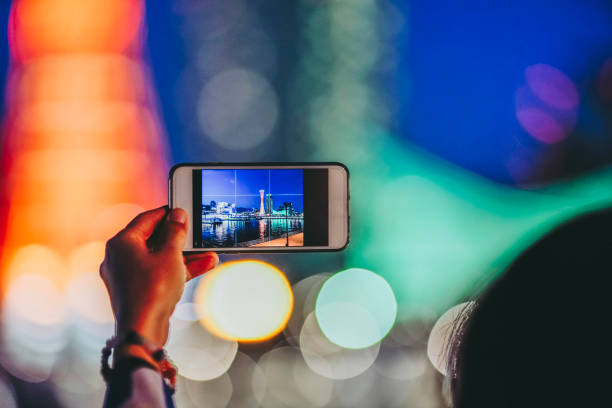 istock A person shooting a night scene with a smartphone 1181720000
