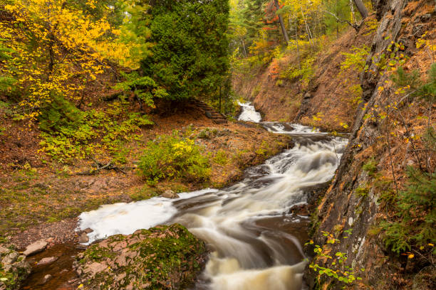 istock Tischer Creek Cascading Waterfall In Autumn 1181720189