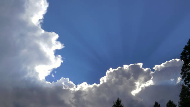istock storm clouds and sun rays at yellowstone 1181724234