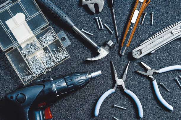 istock Black background with lots of arranged tools 1181724648