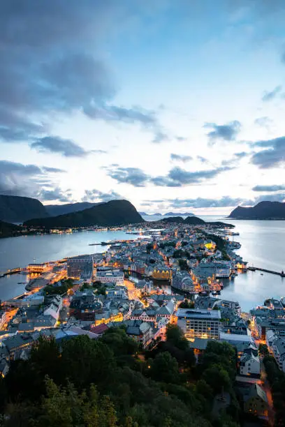 View of Alesund from Fjellstua. Viewpoint on top of the mount Aksla. City of Ålesund in Norway is beautifully situated on several islands on the coast of Sunnmøre, and is the gateway to some of the world's most famous fjords and natural attractions.