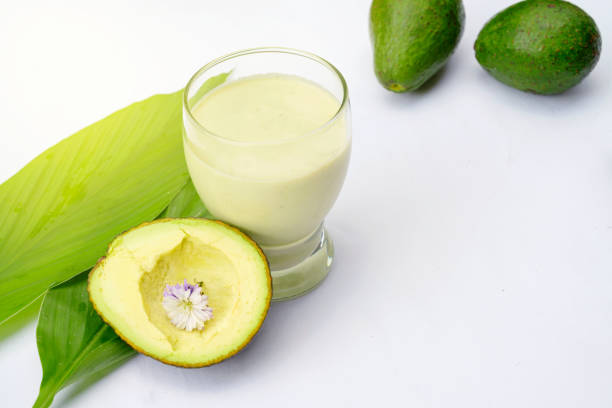 istock Avocado healthy juice on white background 1181730498