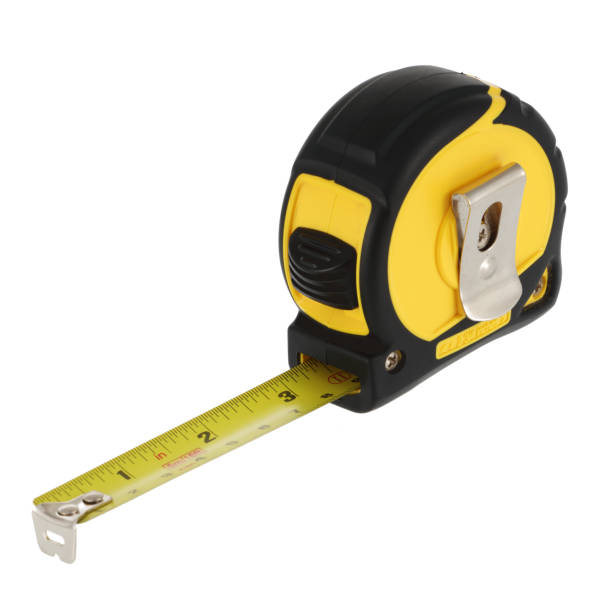 régua de aço inclinada em um fundo branco - tape measure centimeter ruler instrument of measurement - fotografias e filmes do acervo