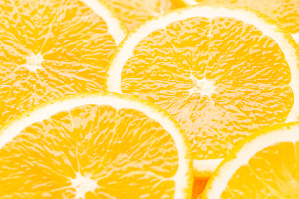 istock slices of orange isolated on white background 1181738499