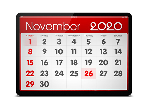 (Clipping path) November 2020 calendar on digital tablet isolated