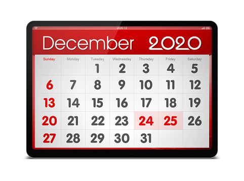(Clipping path) December 2020 calendar on digital tablet isolated