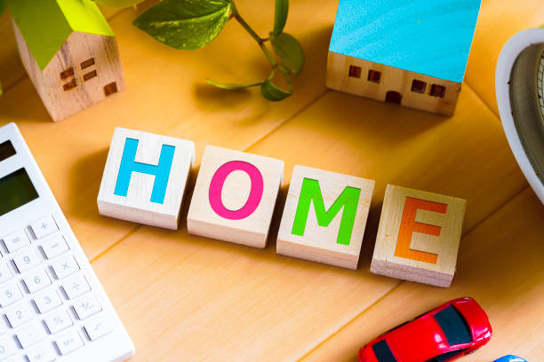 istock HOME letters and housing background 1181747369