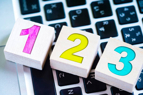 istock Number 123 and laptop background material 1181747432
