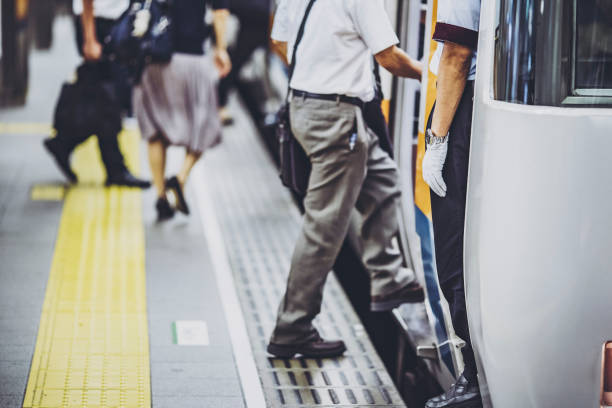 istock People using trains and departure and arrival images 1181748426