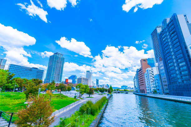 Cityscape of office buildings lined with blue sky