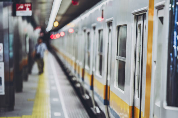 istock People using trains and departure and arrival images 1181748581