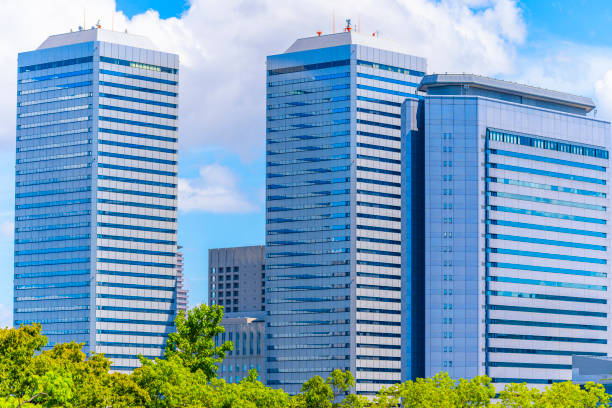 istock Cityscape of office buildings lined with blue sky 1181748603