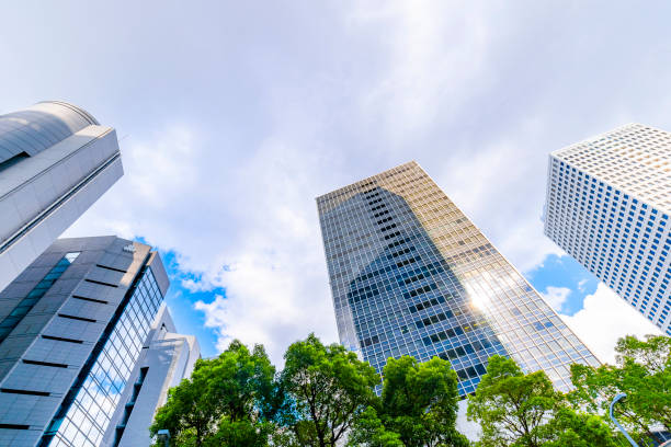 istock Cityscape of office buildings lined with blue sky 1181748637