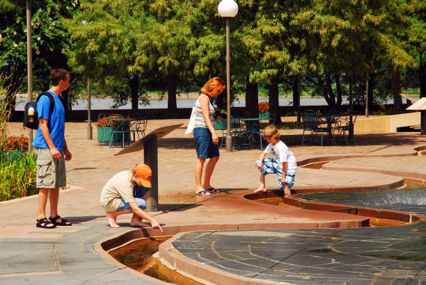Boy in Water tunnel in the water amusement park.