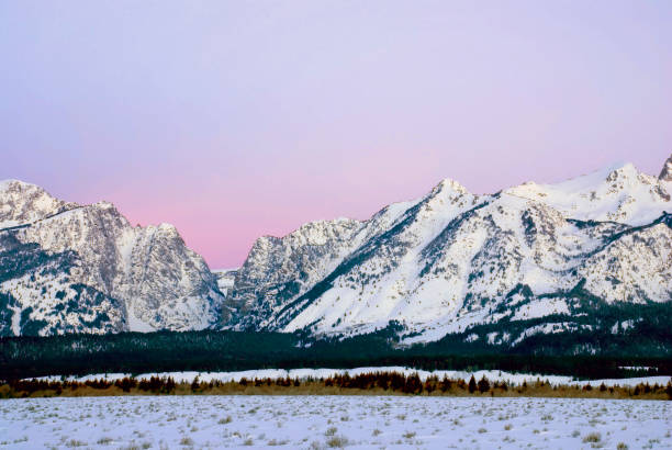 istock Pink light over a high pass in the Tetons 1181749807