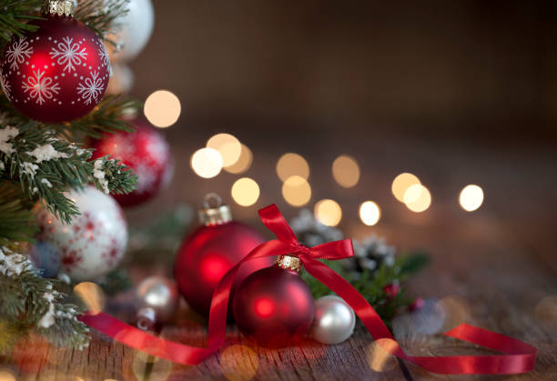 istock Christmas Tree with Red and White Ornaments on a Wood Background 1181752023
