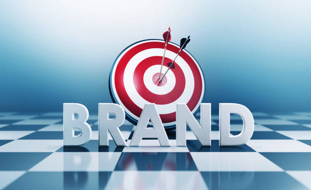 Red bulls eye target and brand text standing on chess board. Horizontal composition with copy space. Advertisement concept.
