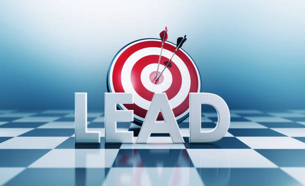 istock Red Bulls Eye Target and Lead Text Standing on Chess Board 1181761153