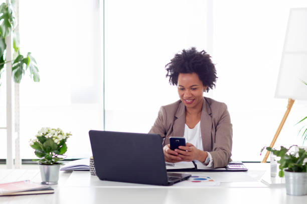 istock Typing message on mobile phone at the office 1181762038
