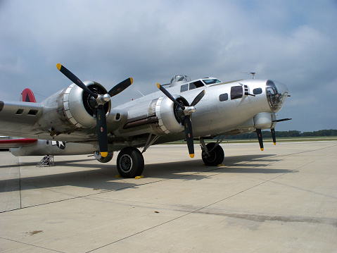 World War II bomber parked on runway. B-17.