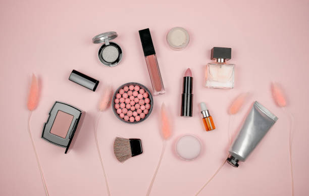 istock Makeup and cosmetic beauty tools on pink background. 1181766371