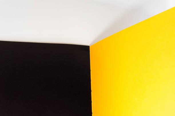 istock opened blank  book at white black yellow design paper background. 1181766768