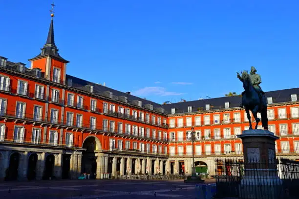 Plaza Mayor with statue of King Philips III in the City of Madrid, Spain