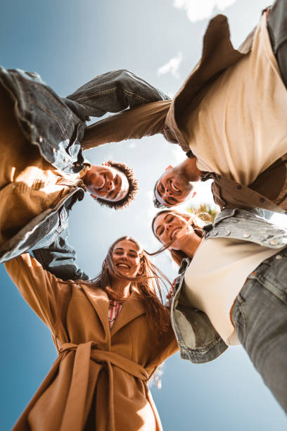 istock friends embracing in Barceloneta 1181767583