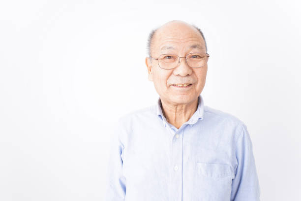 istock Senior man smiling on white background 1181769776