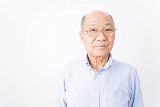 istock Senior man smiling on white background 1181769782