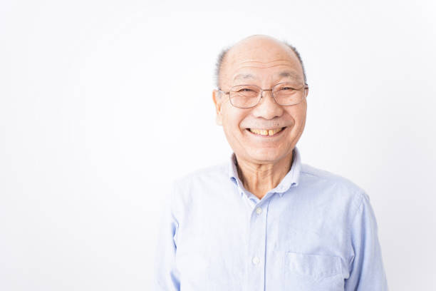 istock Senior man smiling on white background 1181769785
