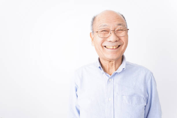istock Senior man smiling on white background 1181769786