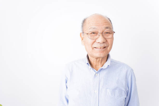 istock Senior man smiling on white background 1181769791