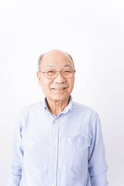 istock Senior man smiling on white background 1181769797
